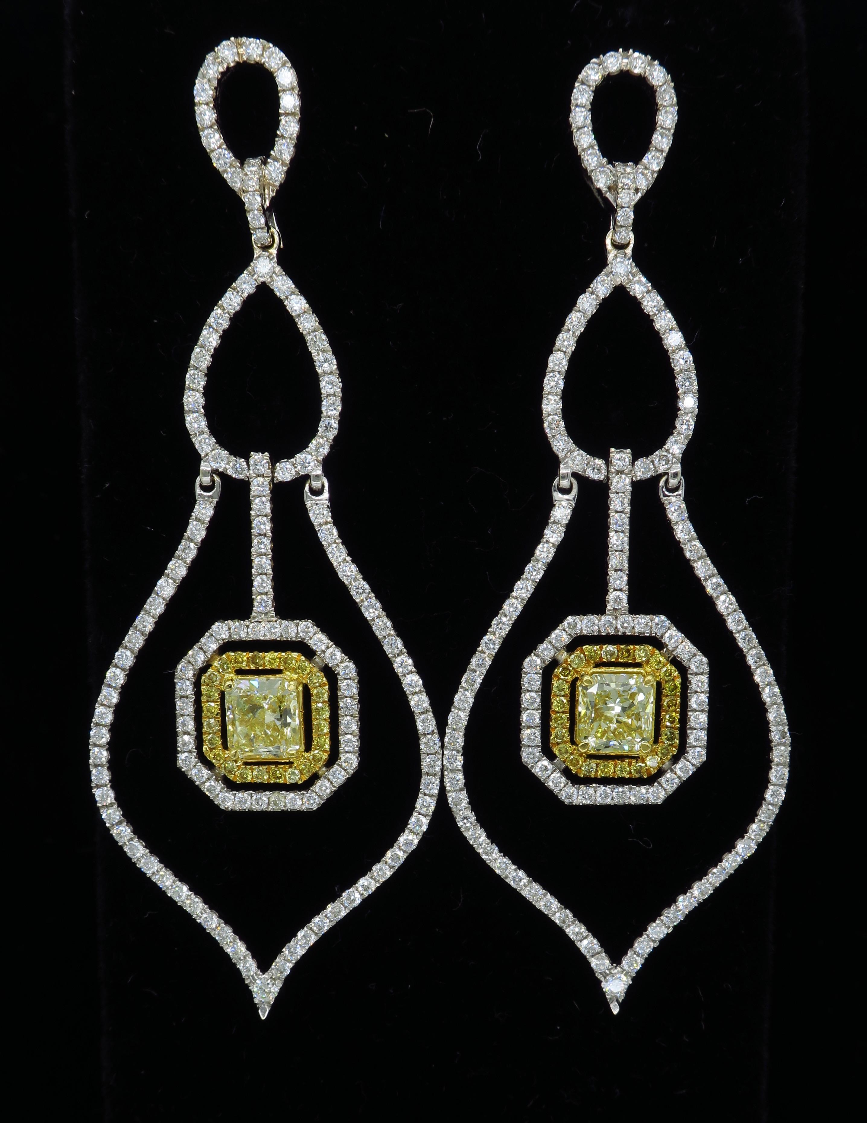 Chandelier earrings by Savransky with GIA certifications.  All Savransky pieces have exquisite craftsmanship and are one of a kind in their design. The earrings feature two Radiant Cut Fancy Yellow Diamonds; one featured diamond is approximately