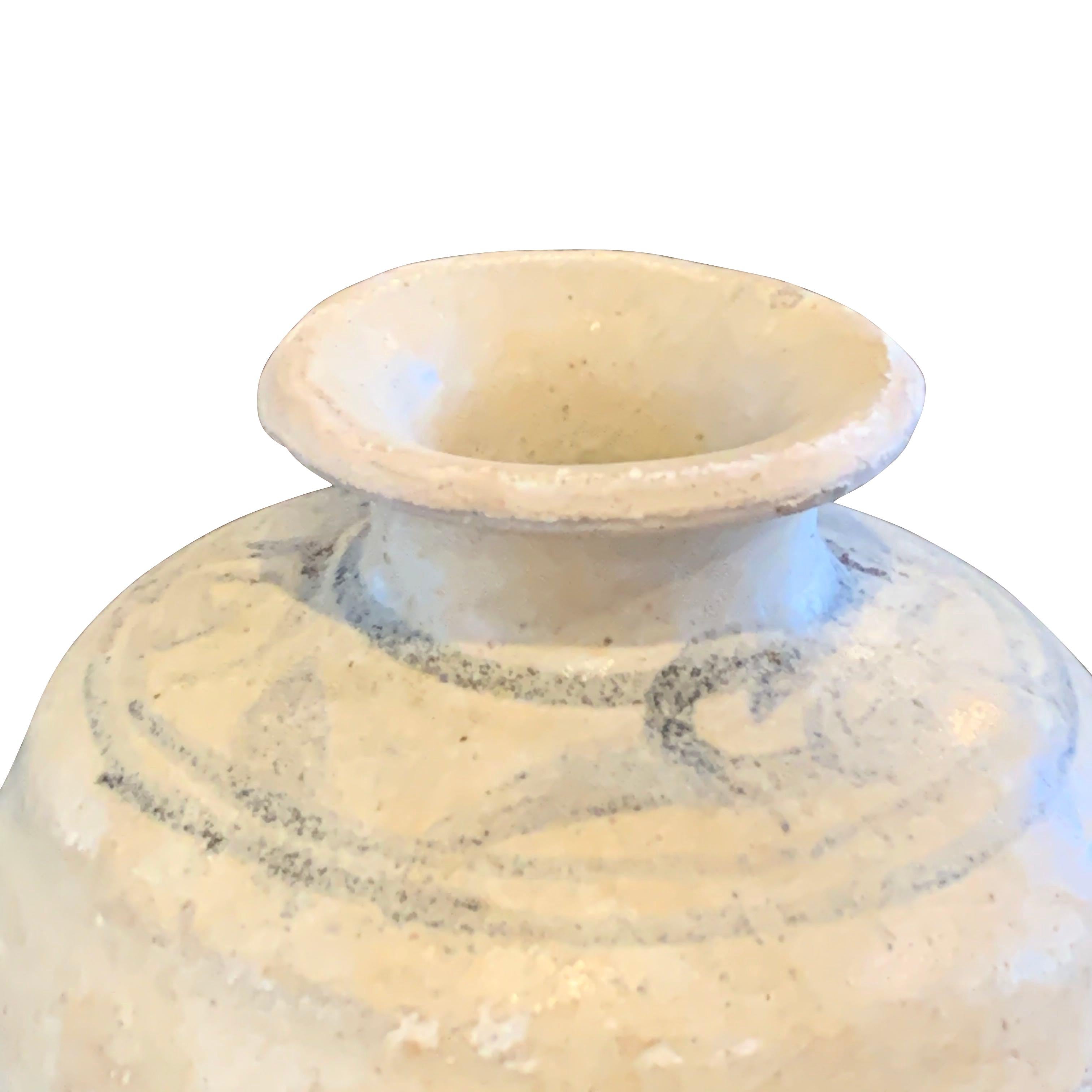 16th century pottery from the Sawankhalok district in the Sukhothai Provence of Thailand
Hand painted pale grey decoration
Natural aged patina.

