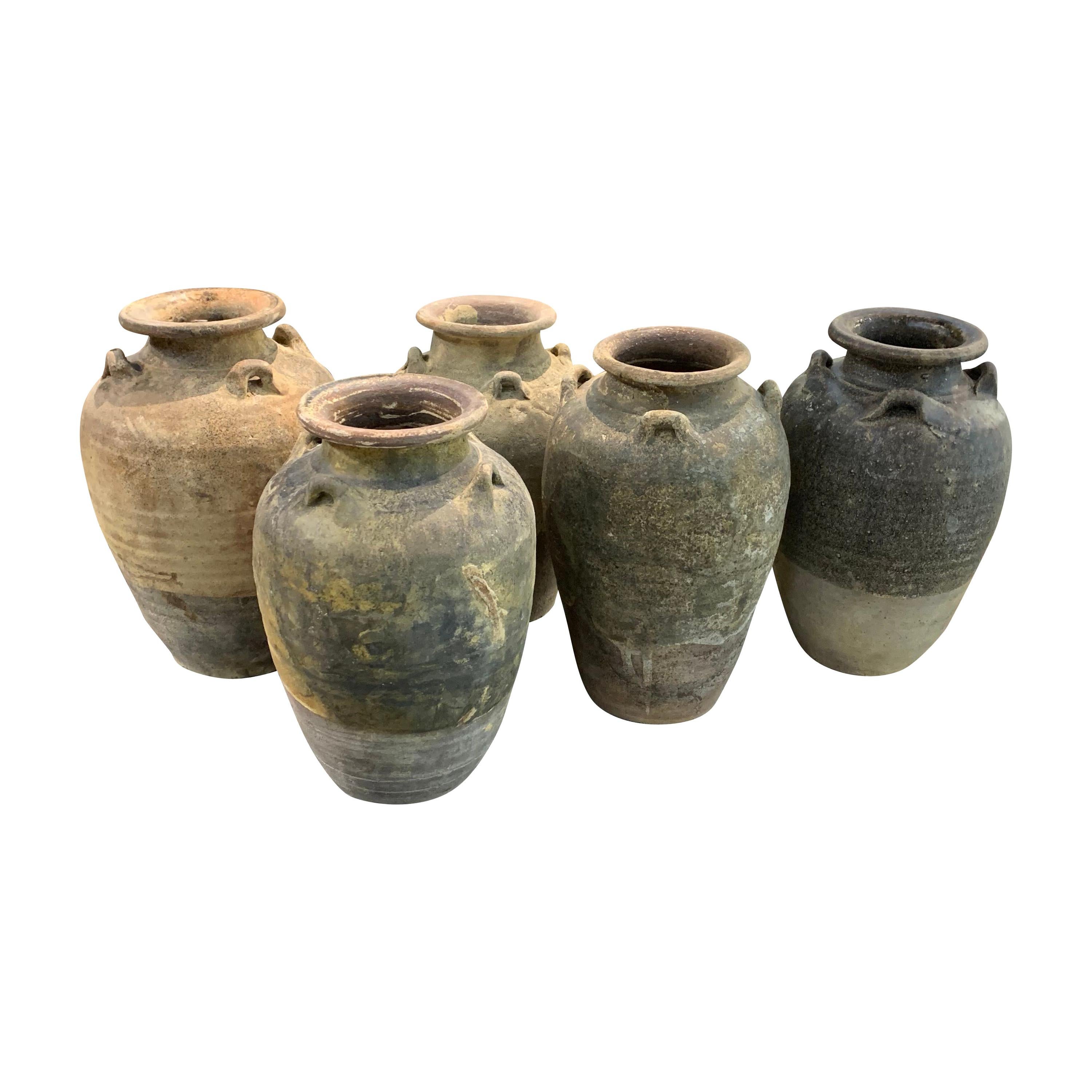 16th century Thailand Sawankhalok ceramic vase from the old city of Sawankhalok known for its pottery.
They are from the Sukhothai period.
Two pieces are available and sold individually
Beautiful natural original patina.
      
