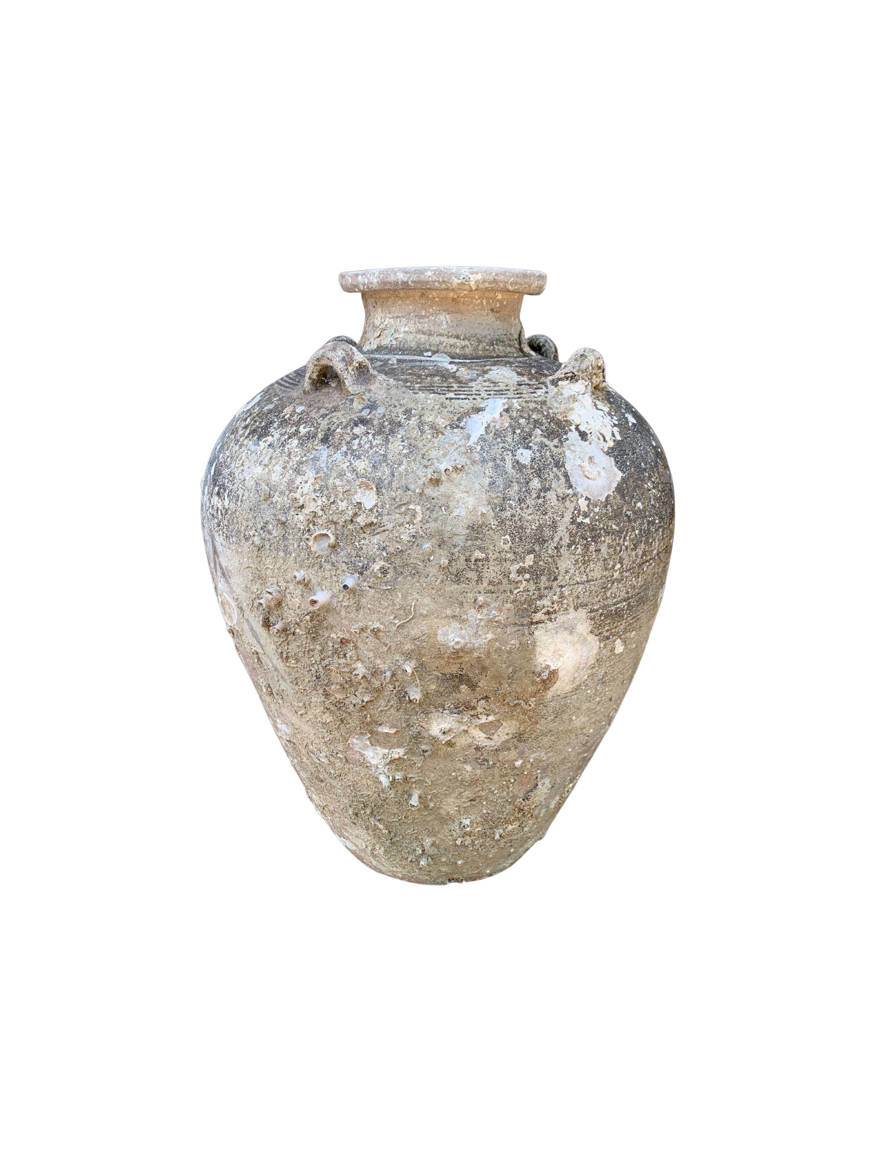 A wonderful example of a 16th Century Sawankhalok jar from a Shipwreck off the Coast of the Indonesian Island of Batam. Batam was one of the most substantial and influential ports in the South China Sea where an abundance of trade was conducted.