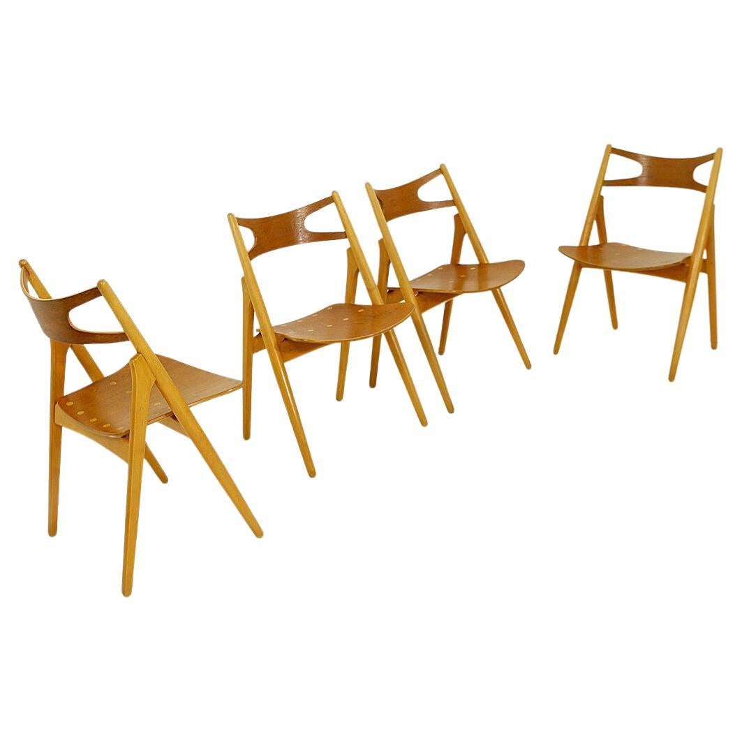 Sawbuck' Chairs by H. Wegner at 1stDibs