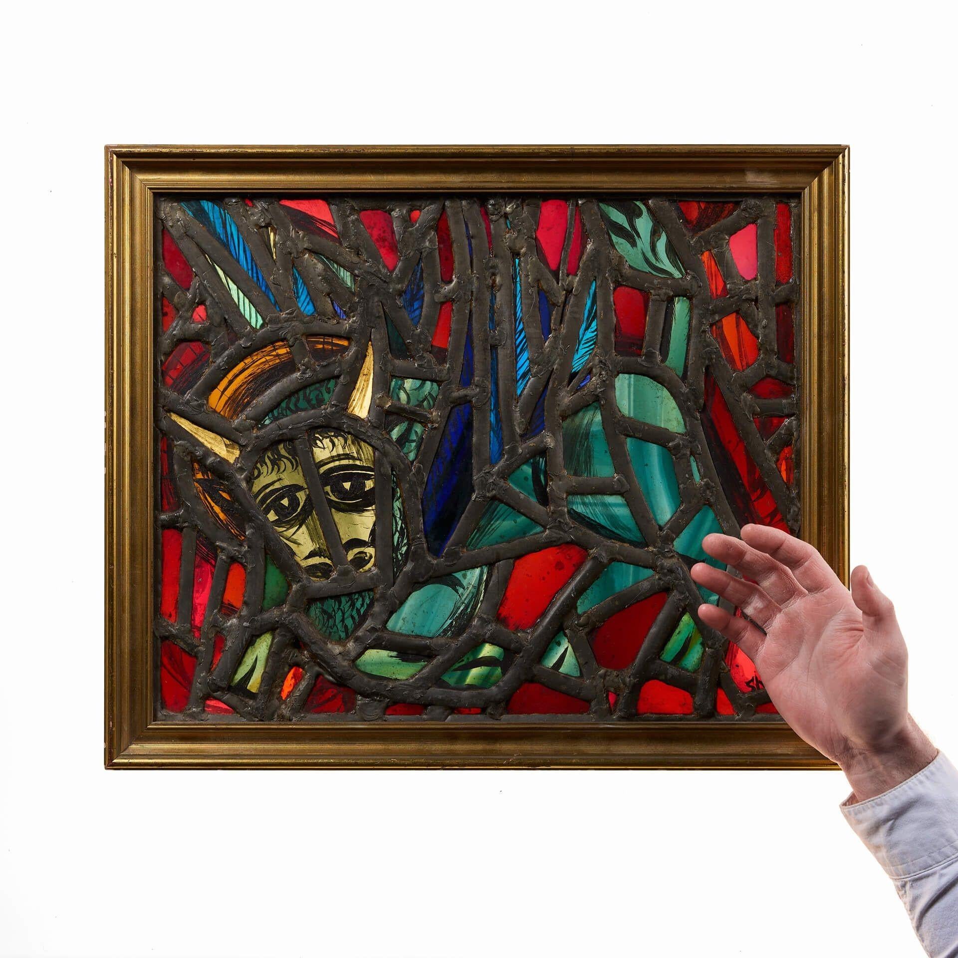 A vibrant framed stained glass panel titled ‘The Bull’ by British stained glass artist, Sax Shaw (signed). Made circa 1980-1990, this colourful stained glass window was featured in a posthumous memorial exhibition in Whitespace Gallery, Edinburgh in