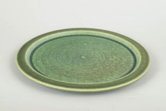 Saxbo, Denmark. Large stoneware dish with green glaze. Mid-20th C.