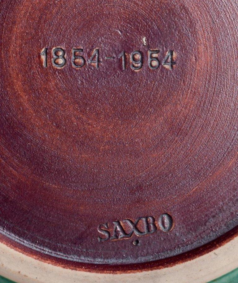 Glazed Saxbo, Denmark. Small ceramic bowl featuring a motif of a standing bear. For Sale