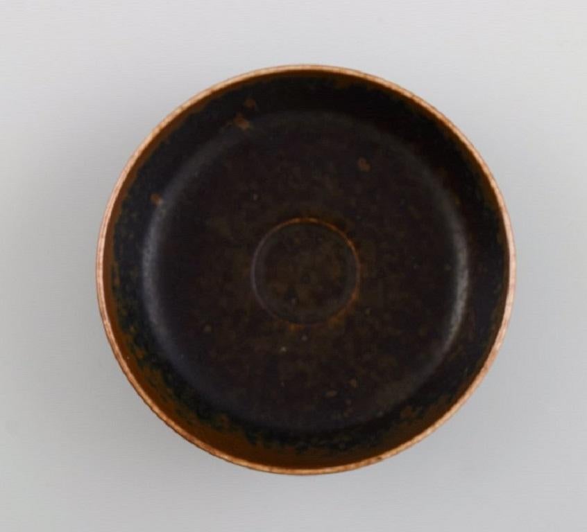 Saxbo miniature bowl in glazed ceramics. 
Beautiful glaze in brown shades. 
Mid-20th century.
Measures: 9.5 x 2.8 cm.
In excellent condition.
Stamped.