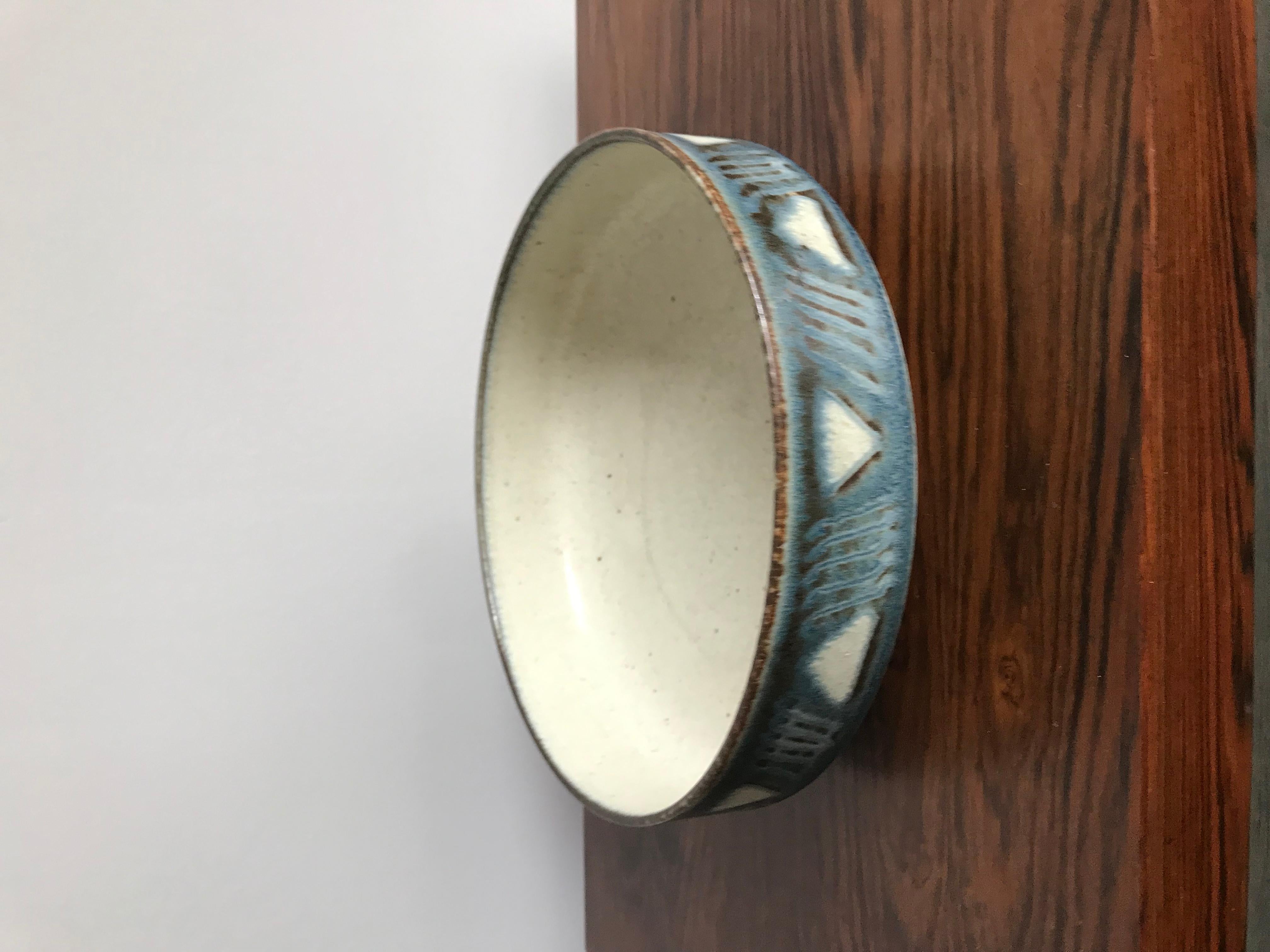 Scandinavian Mid-Century Modern design ceramic bowl or centerpiece designed by Saxbo,
marked below base, Denmark, circa 1950s.