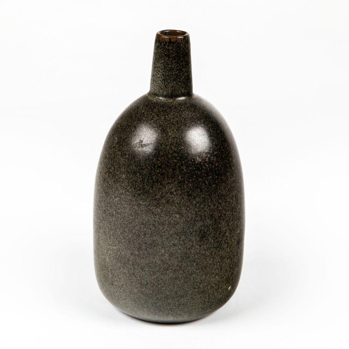 Elegant stoneware pitcher with a rich brown glaze, designed by Danish ceramist Erik Rahr (1908–1982) for Saxbo.

A fine example of modernist Danish ceramic design, marked on the base with both the Saxbo hallmark and the initials E.R.
Produced during