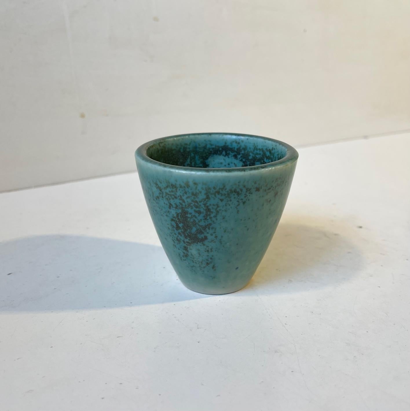 Small conical vase executed with spotted teal green hares fur type glaze. It is a a rare one made at Saxbo in Denmark during the 1950s as a glaze sample prior to a larger volume. The vase is marked with the glaze sample number: 1A and does not have