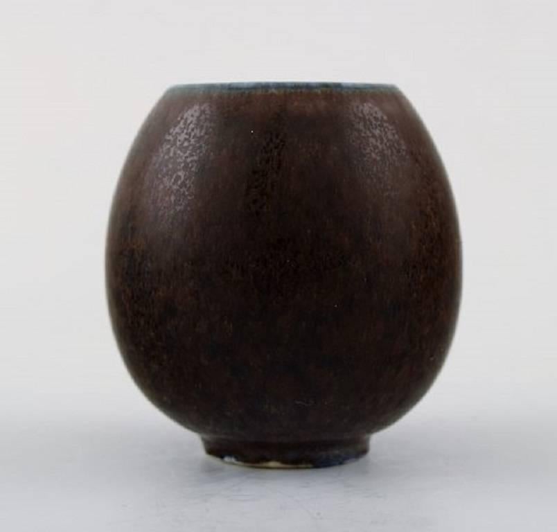Saxbo, small ceramic vase, beautiful glaze in brown shades.
Model number 4.
Stamped. Denmark mid-20th century.
In perfect condition.
Measures: 5.5 x 5.5 cm.