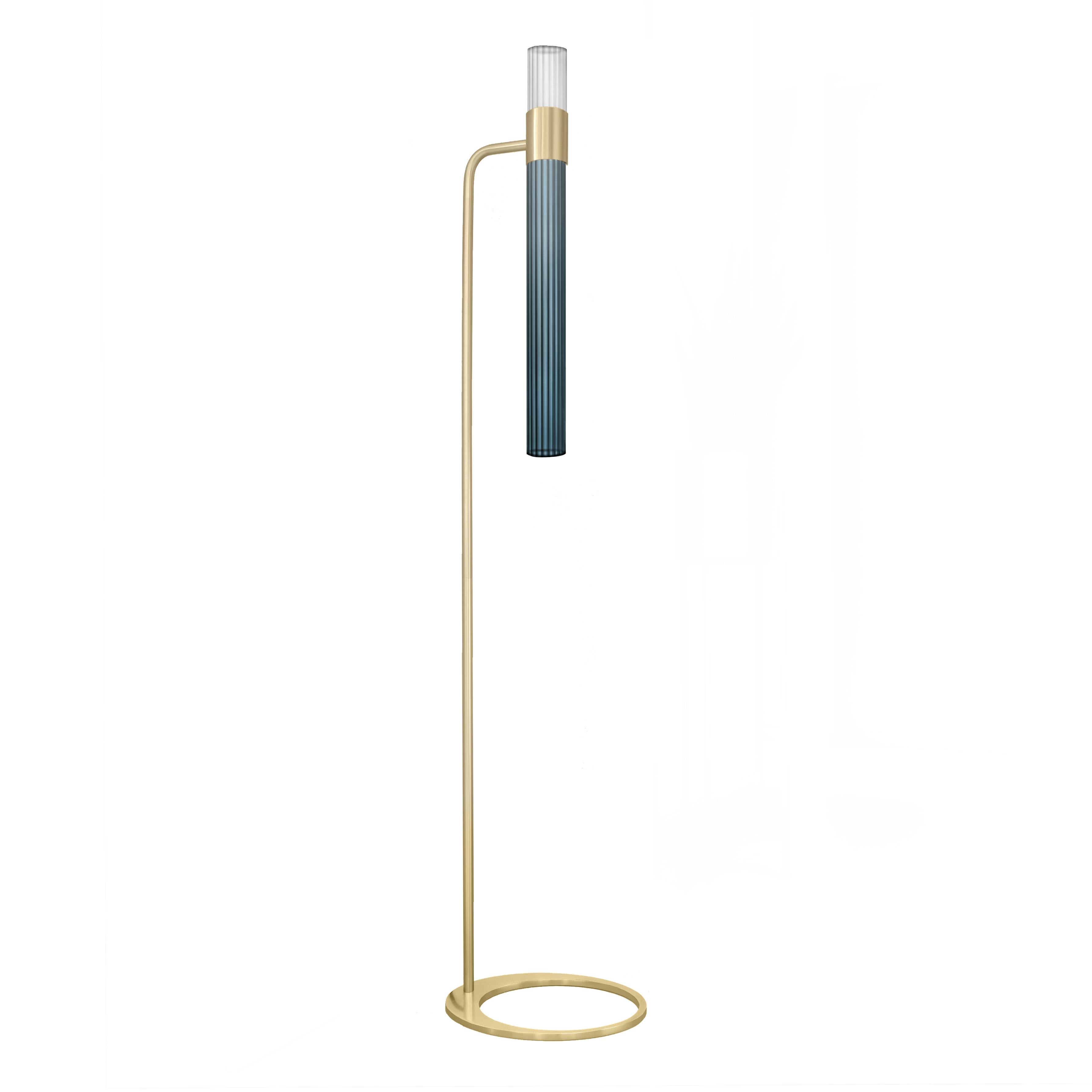 Sbarlusc floor lamp by LUCE TU
Dimensions: 149 x 32.5 cm
Materials: Brass and glass

Sbarlusc in Milanese dialect represents the sparkle of a precious and very bright object. The colored glasses, which combine with each other creating games of