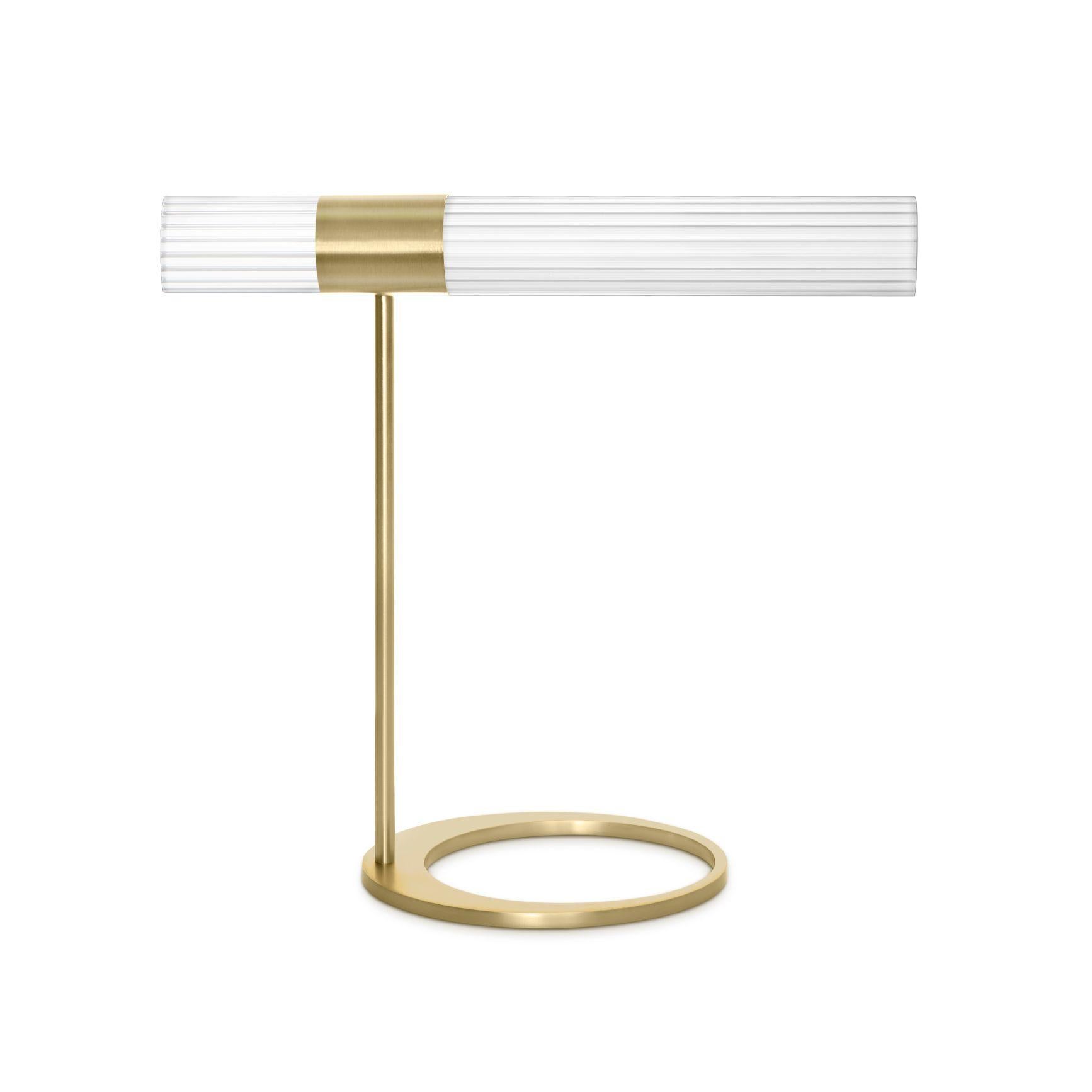 Sbarlusc table lamp by Luce Tu
Dimensions: 49 x 46 cm
Materials: Brass and glass

Sbarlusc in Milanese dialect represents the sparkle of a precious and very bright object. The colored glasses, which combine with each other creating games of