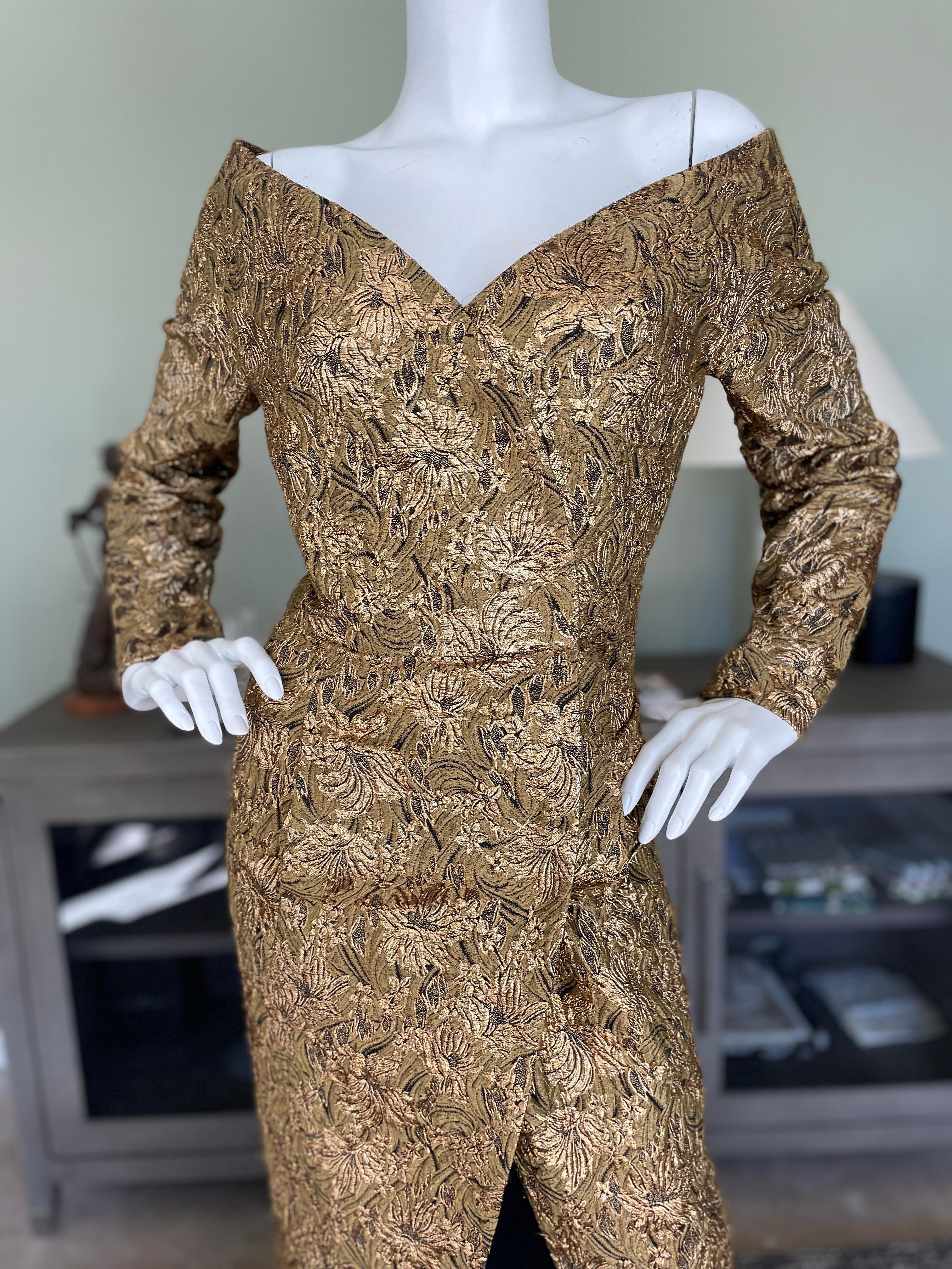 Scaasi 1980s Gold Floral Brocade Off the Shoulder Wrap Dress.
This is a true wrap dress with multiple snaps to close.
Size 14 vintage is 10 today
 Bust 38