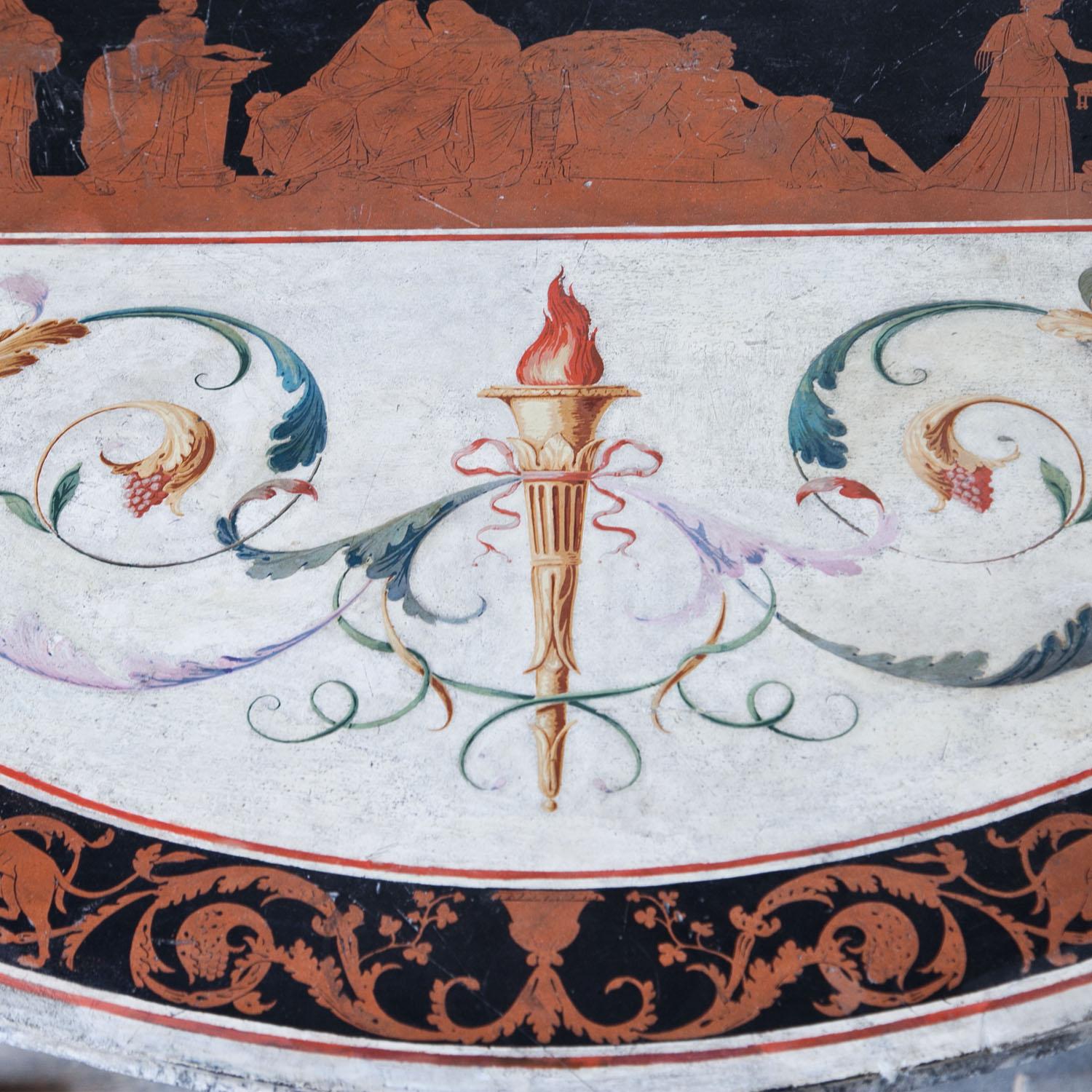 Round tabletop, decorated in Scagliola technique. A band in terracotta-color on a black ground frames the tabletop and depicts leaping panthers and vines. The white tabletop shows two polychrome torches surrounded by leaves and a central panel,