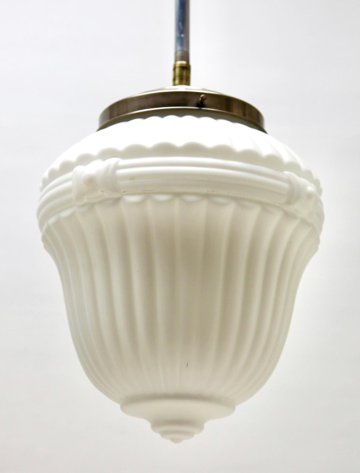 From the range by Scailmont Belgium, this centre-light is on a central stem. 
The lamp has a fitting on a Solid chrome plate and holds a shade of opaline glass.

In good condition and in full working order 
Fitting E27 and new kabel
And has