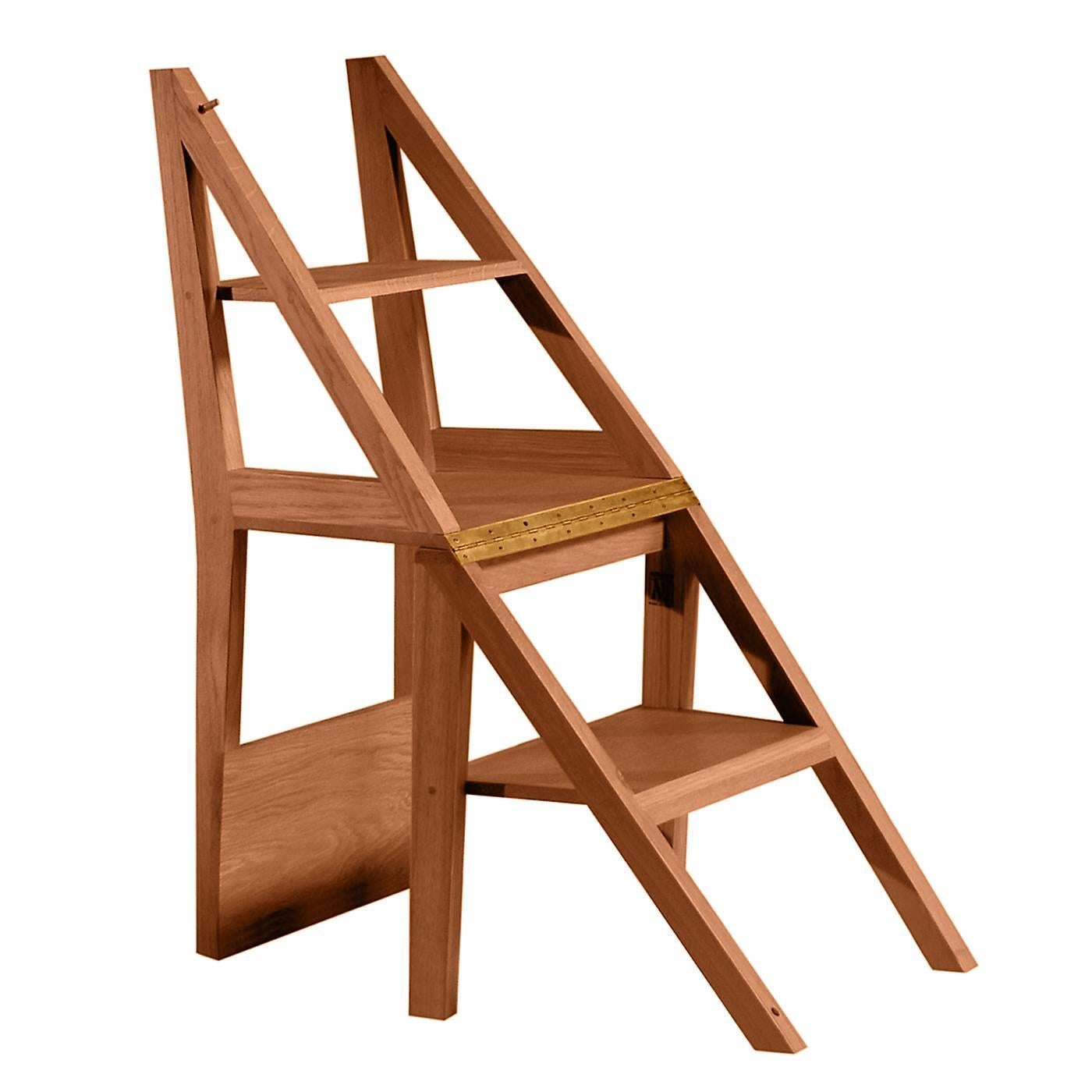 This chair, made entirely in ashwood, is characterized by a sturdy bottom structure with an N shape that allows the shelf located below the seat to become a practical step, making this versatile piece of functional design also a stepladder. The