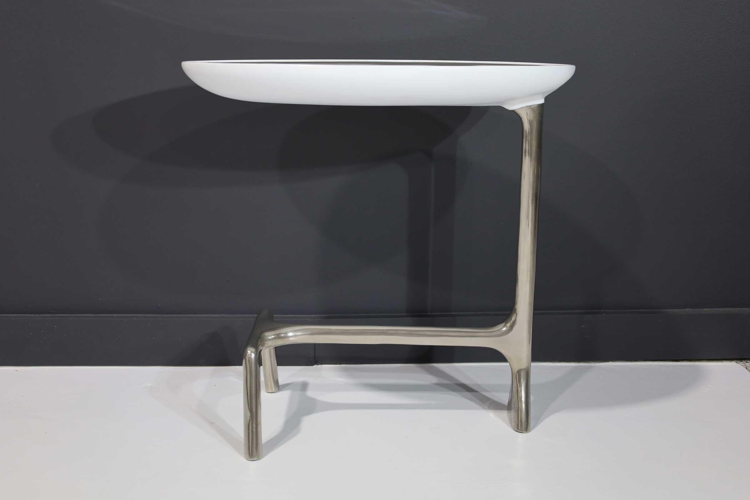 Gorgeous table by Scala Luxury. A polished nickel base and goatskin top. This piece is a solid base side table that has been brush polished. The goatskin top is made from one rare large shagreen skin. The top has a white high gloss lacquer finish