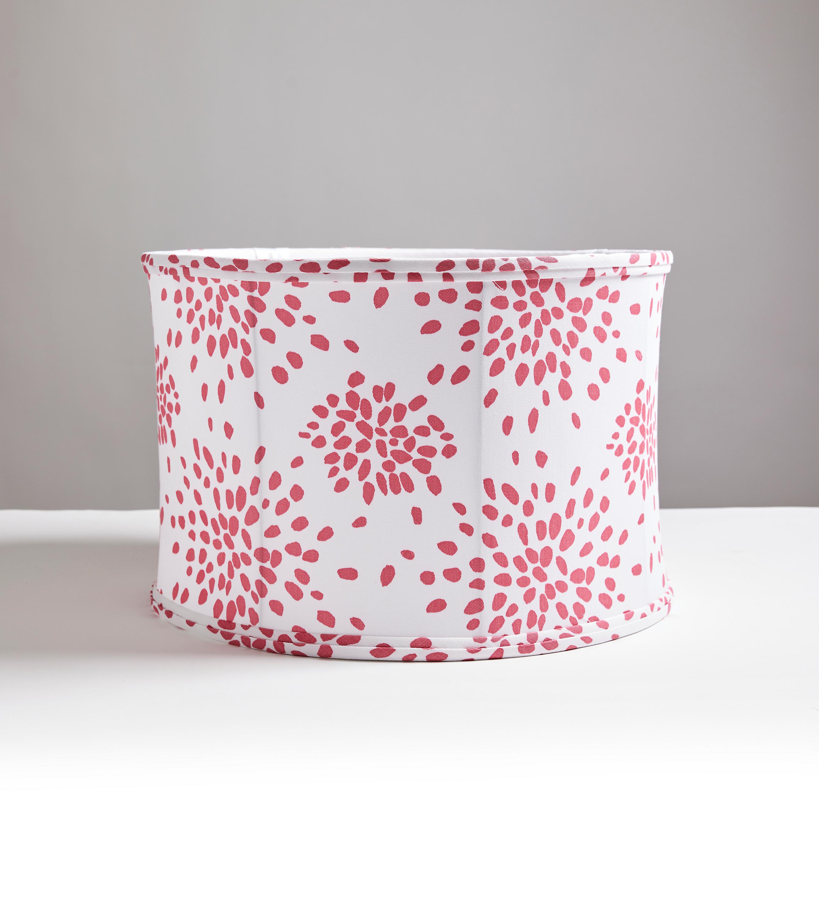 Fireworks, a well-loved pattern from Hinson, is available in printed fabric, wallcovering, luxurious pillows, and now, beautiful, handcrafted lampshades in drum and pleated styles. This energetic, allover pattern features graphic bursts of