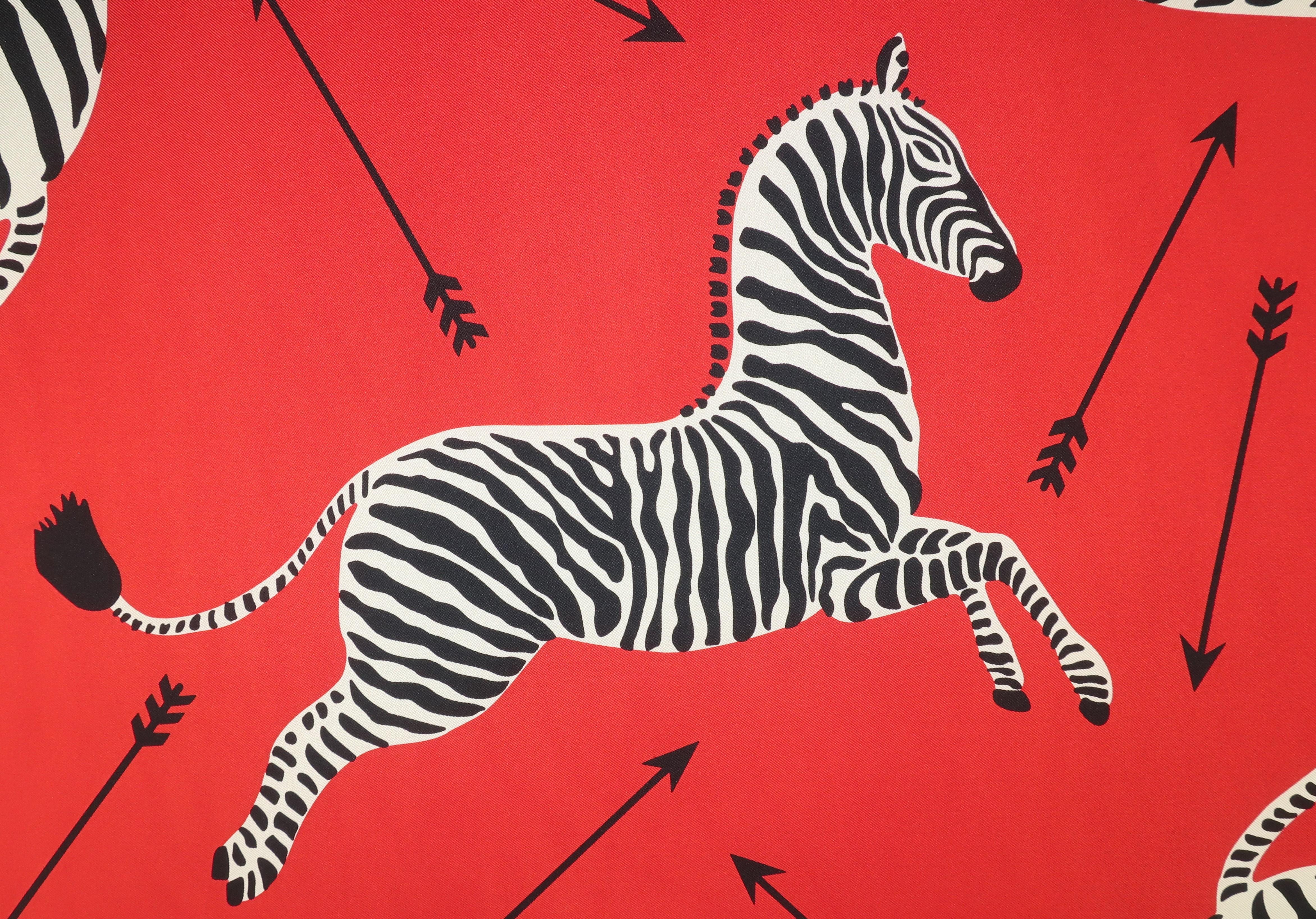 The iconic zebra pattern by Scalamandre dates back to the 1940’s.  It is a playful design with elements of Art Deco and modernism all captured in red, black and white high quality silk.  A wonderful fashion accessory with the potential to be a