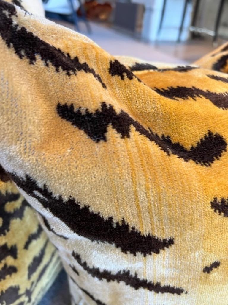 This stunning Scalamandre silk tiger velvet cushions are sold individually. Down filled insert and zippered .