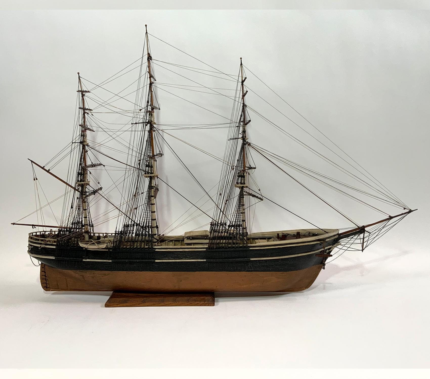 1930’s Era ship model of the Boston built American clipper ship “Flying Cloud”. This is a well-executed model from the 1930s. the carved wood hull has a scribed deck with varnish finish. Built up cabins and hatches are on deck. At the forward deck