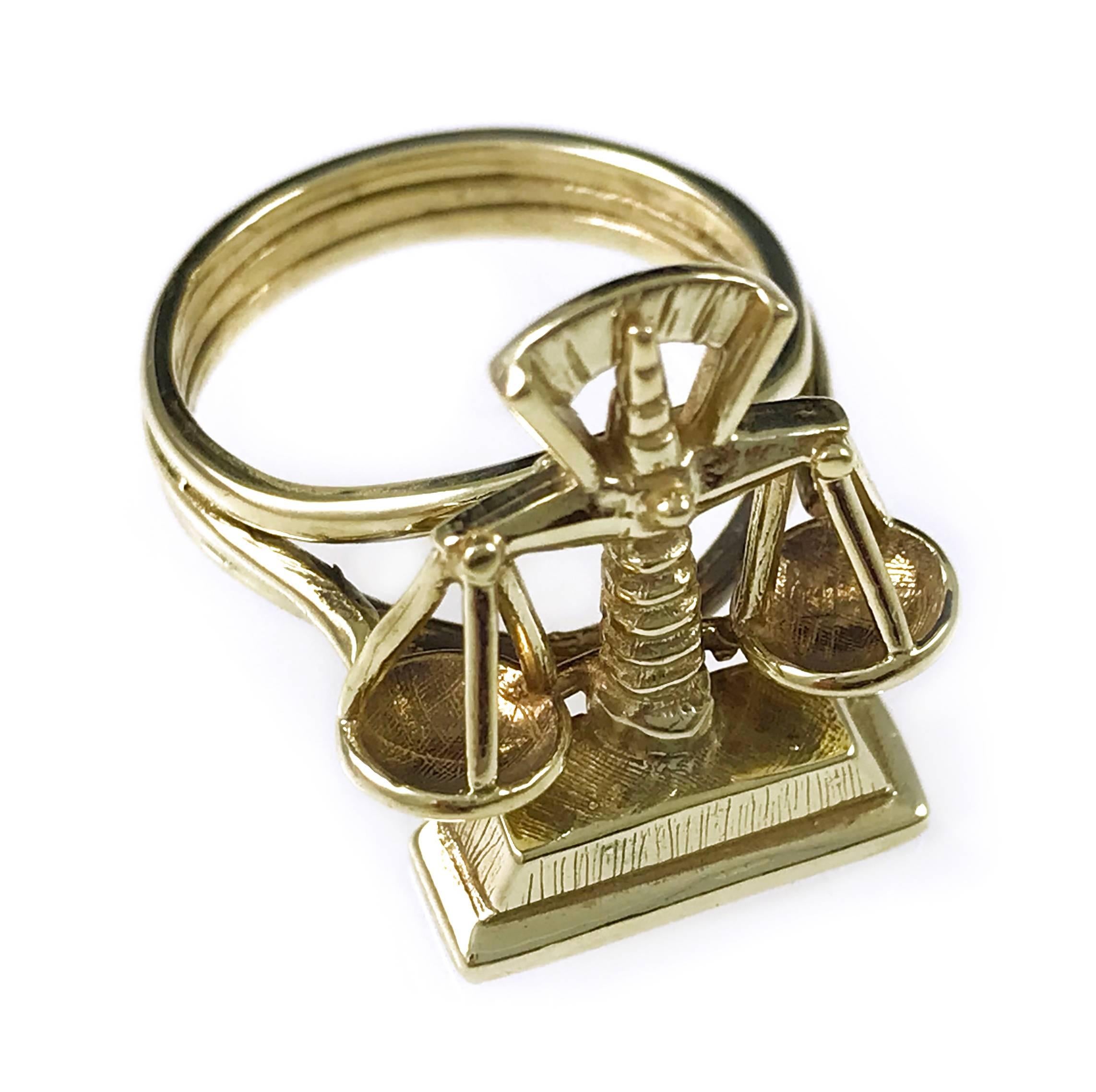Scales of Justice 14k Gold Ring. Three tubular bands combine to hold the Scales of Justice, on the back the letter 