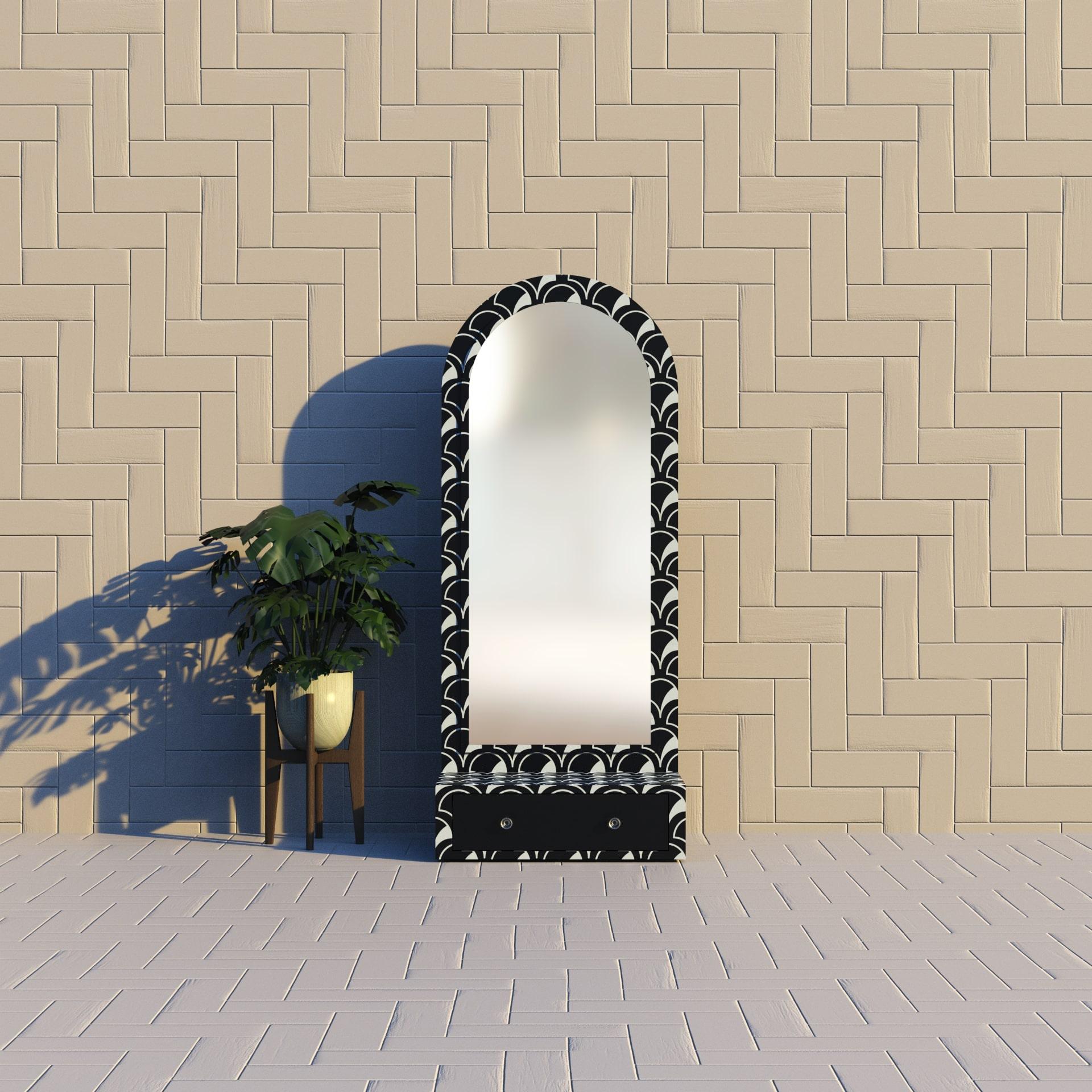 Élevez votre espace avec une élégance intemporelle
Voici le Mirrors Collection Collective, un miroir de sol de couleur noire avec un tiroir dans le bas. Inspiré par les motifs délicats des coquillages à festons, ce miroir présente un design complexe