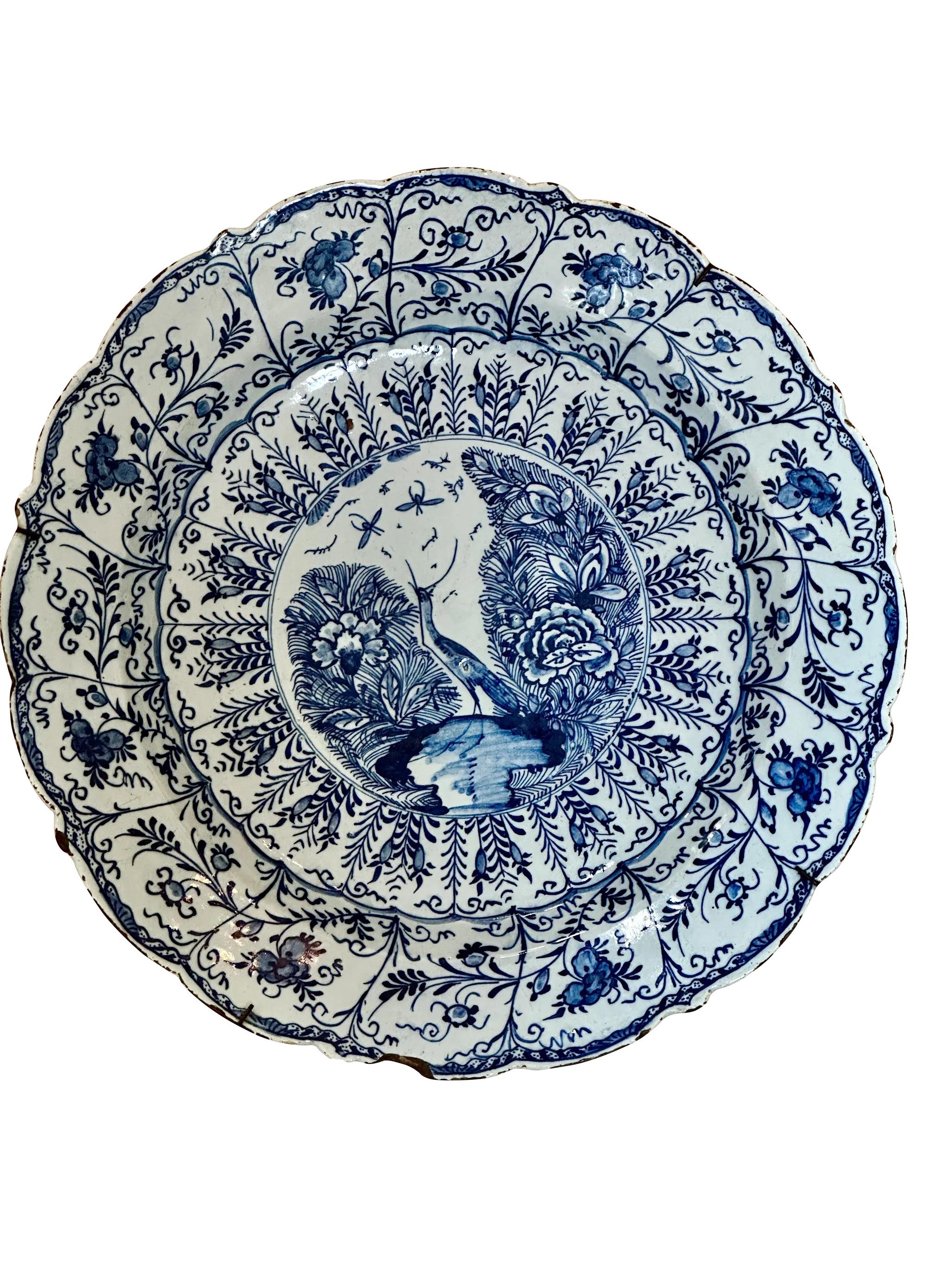 Ceramic Scalloped Blue and White Delft Charger with Crane & Floral Decoration, 18th Cent For Sale