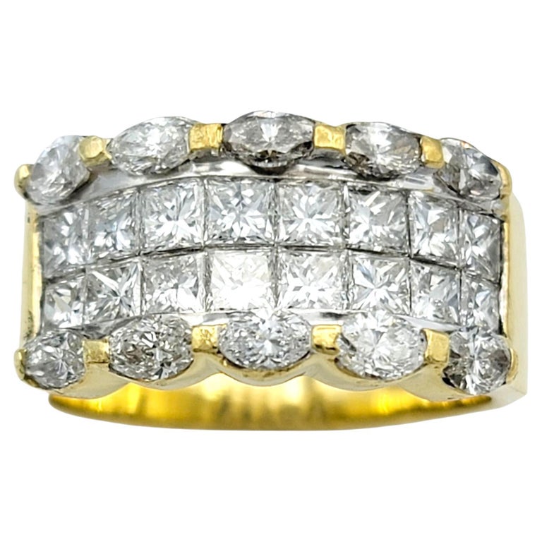 Anillo de diamantes talla princesa y marquesa con borde festoneado