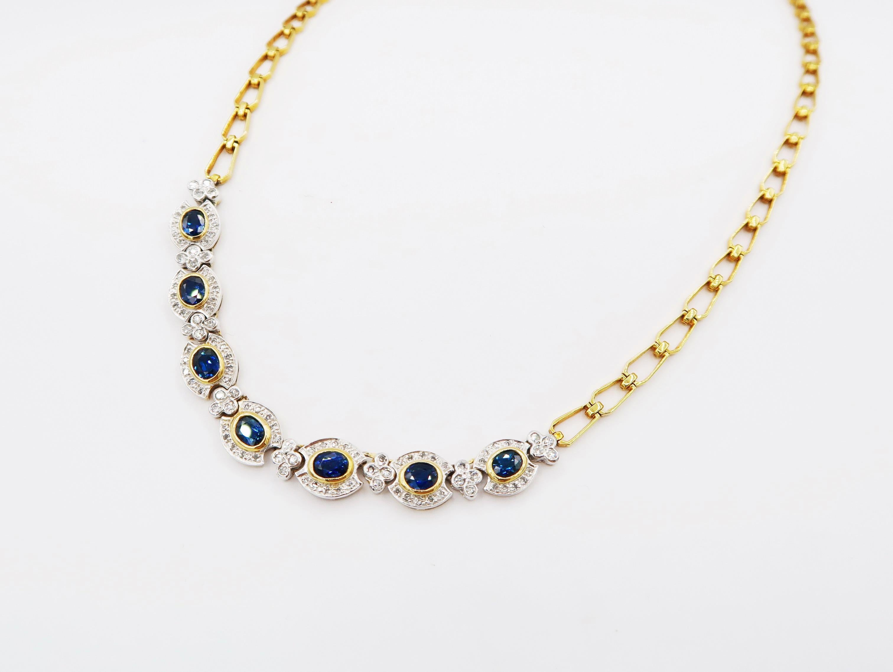 Scalloped Oval Deep Blue Sapphire Pavé Diamond Clover Motif Link Gold Necklace

Gold: 14K Gold, 17.80 g
Sapphire: 6.95 ct
Diamond: 1.65 ct

Length: 18 inches

