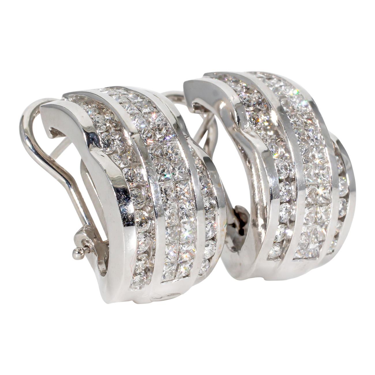 Scalloped style French Clip earrings with invisible set round diamonds.  D3.55ct.t.w.