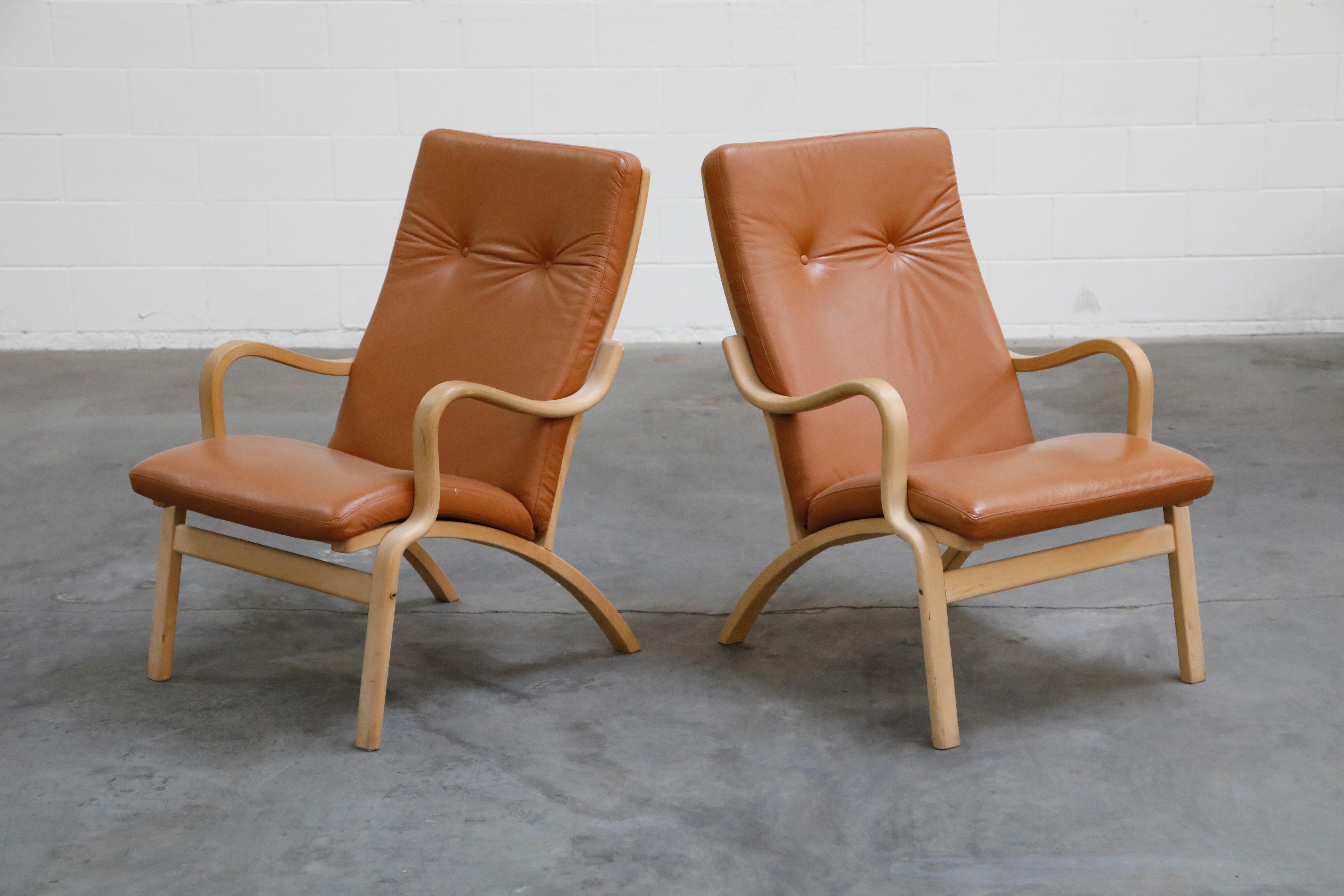 Scandinavian Modern Scandinavian Bentwood Leather Lounge Chairs and Ottoman, circa 1970s