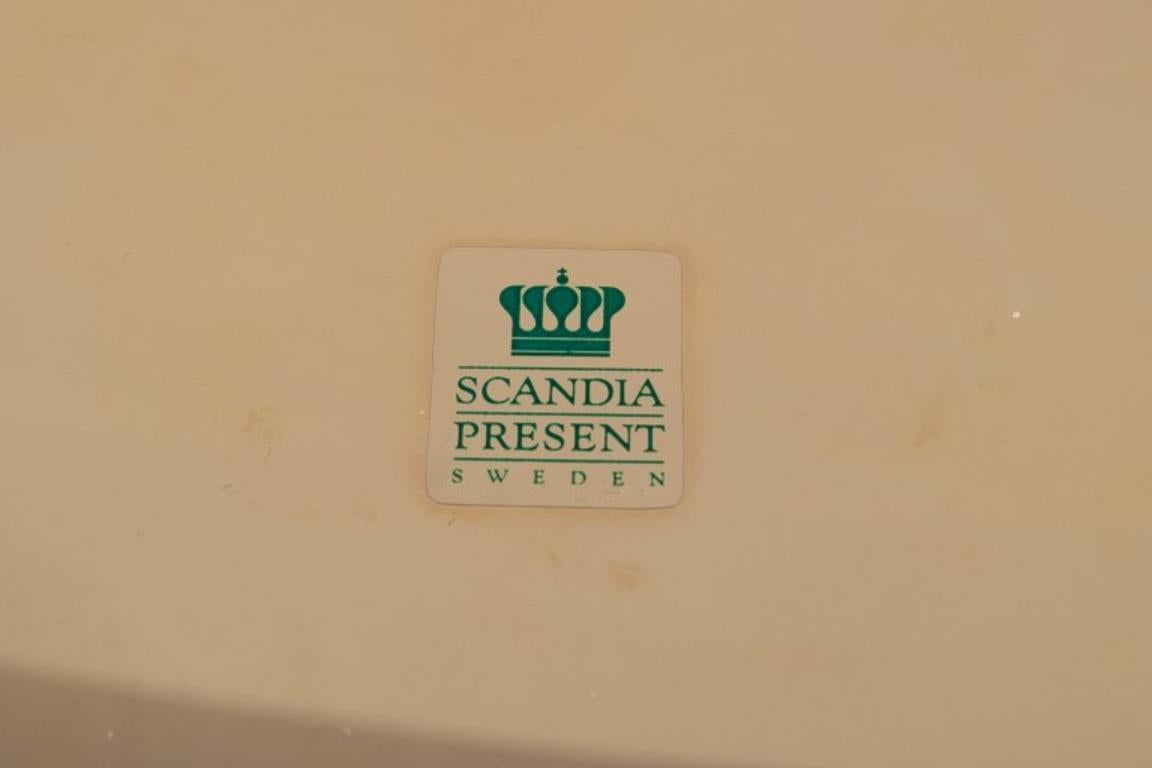 Suédois Scandia Present, Suède. Un ensemble de six plaques de recouvrement en laiton. en vente