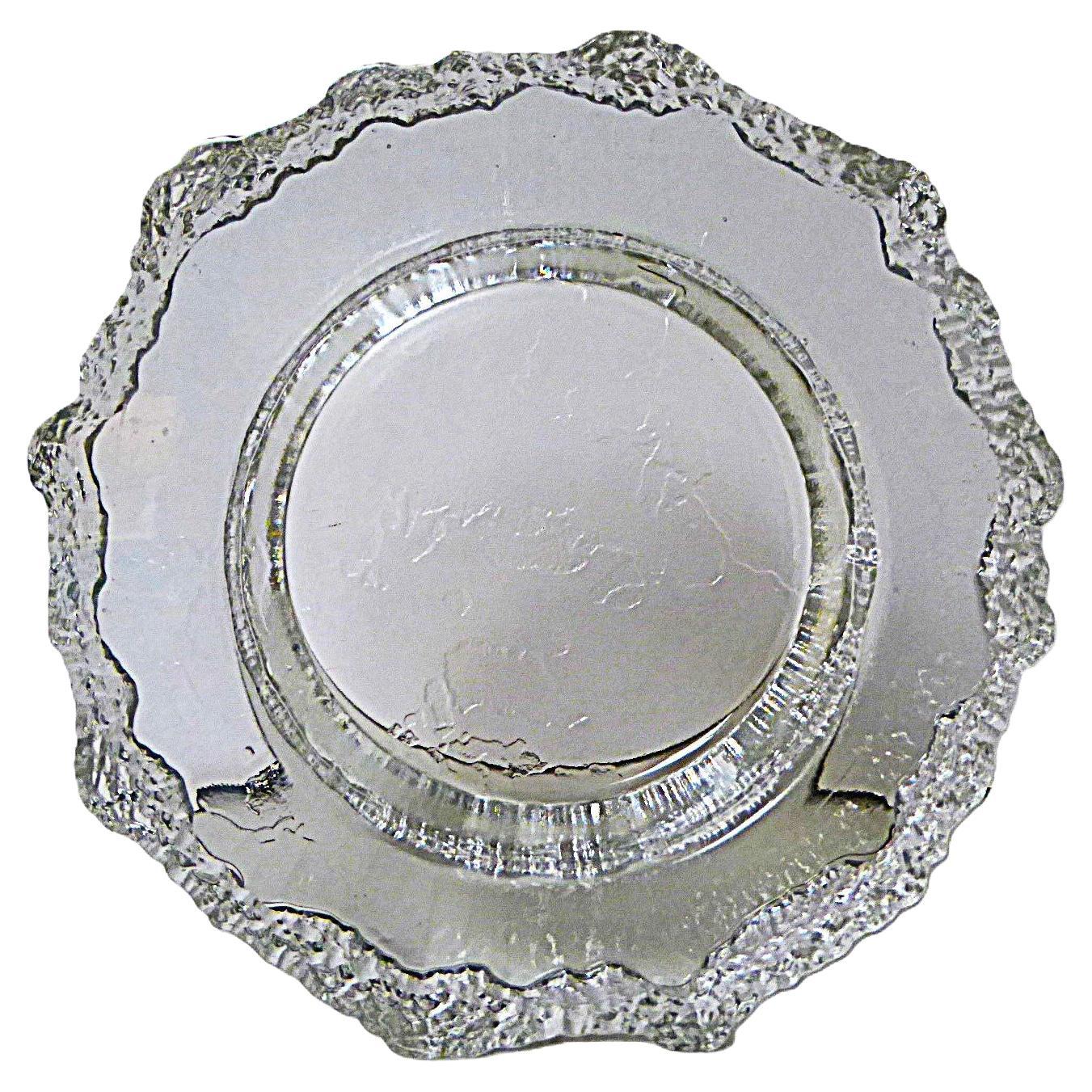 Tapio Wirkkala designed the ASLAK heavy Glass Bowl/Ashtray and was produced by Iittala in the 1970s. This one designed with a map of Europe prominently displayed, in relief on the base, in the center of the bowl and most of the rest of the world