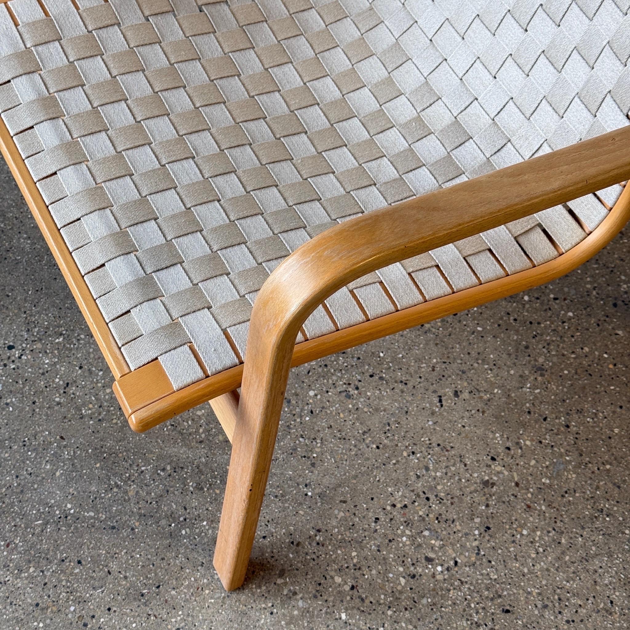 c. 1970s. Woven linen seat and birch wood frame. 

