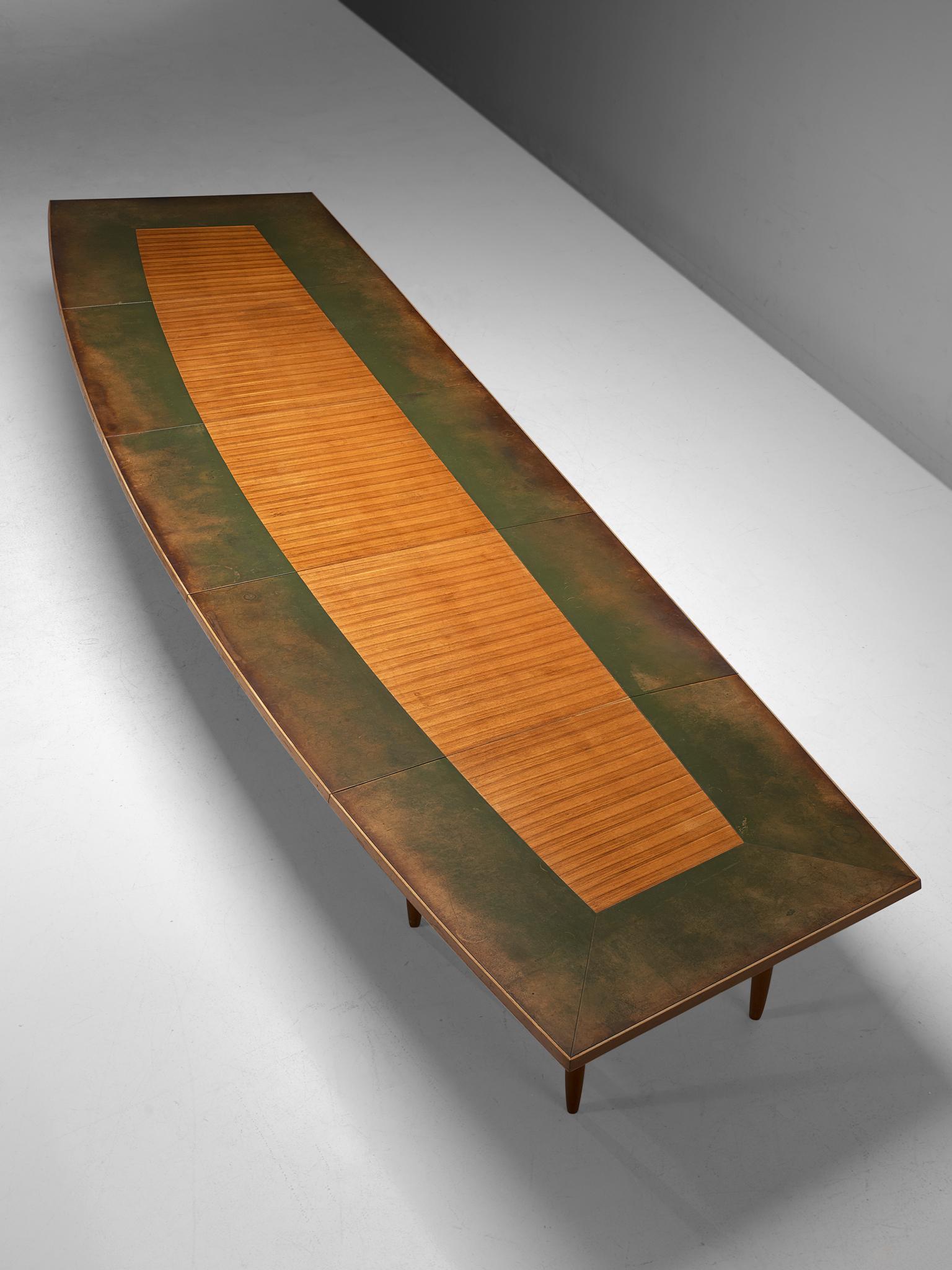 Conference table, walnut, wood and leather, Scandinavia, 1950s.

This nearly 7 metre/23 ft. long conference table is an exquisite piece from the Scandinavian Modern period. Probably custom made, the table features an unusual, yet interesting