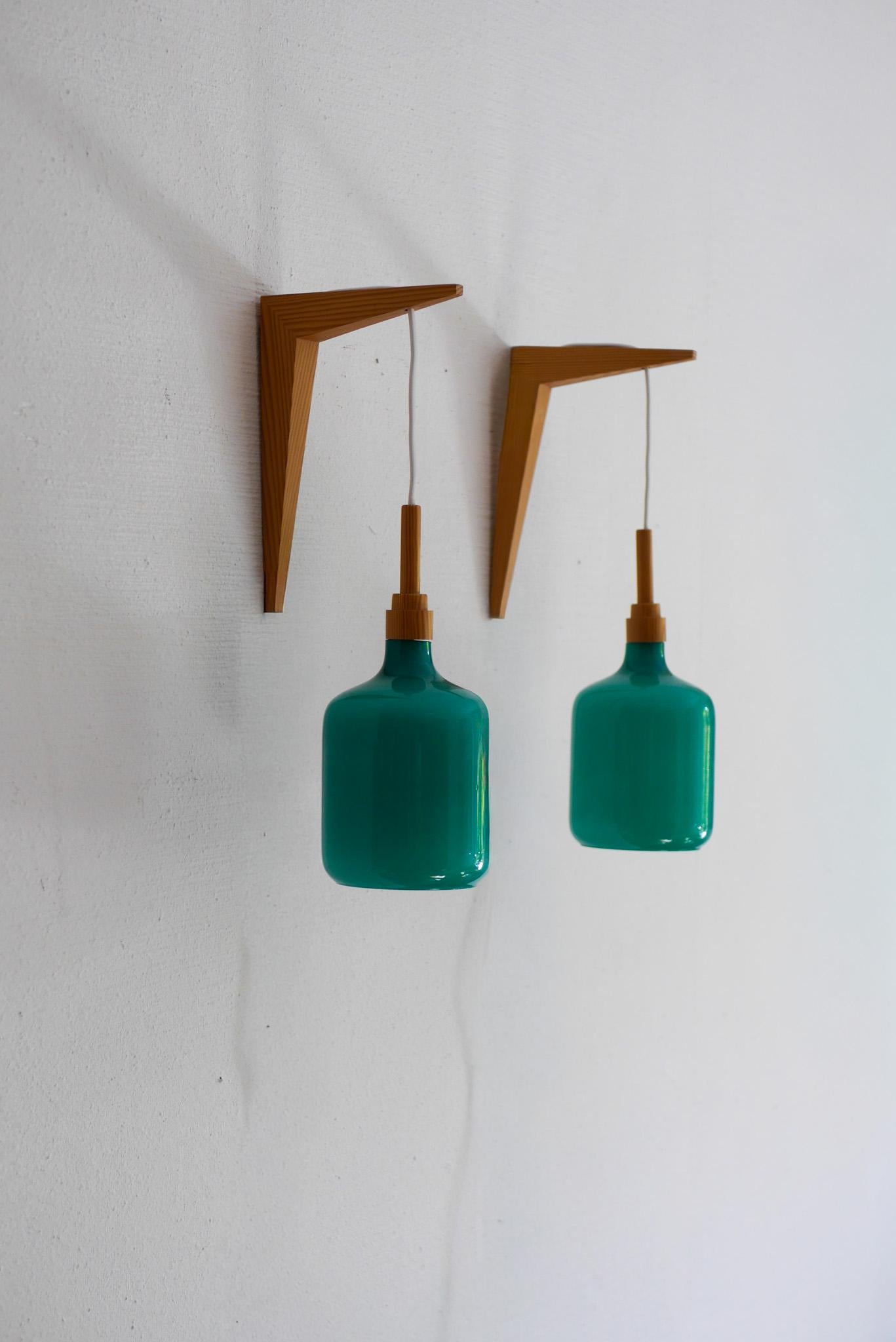 The Scandinavian 70s sconces Mid-century modern opaline glass and pine wall lights en vente 4