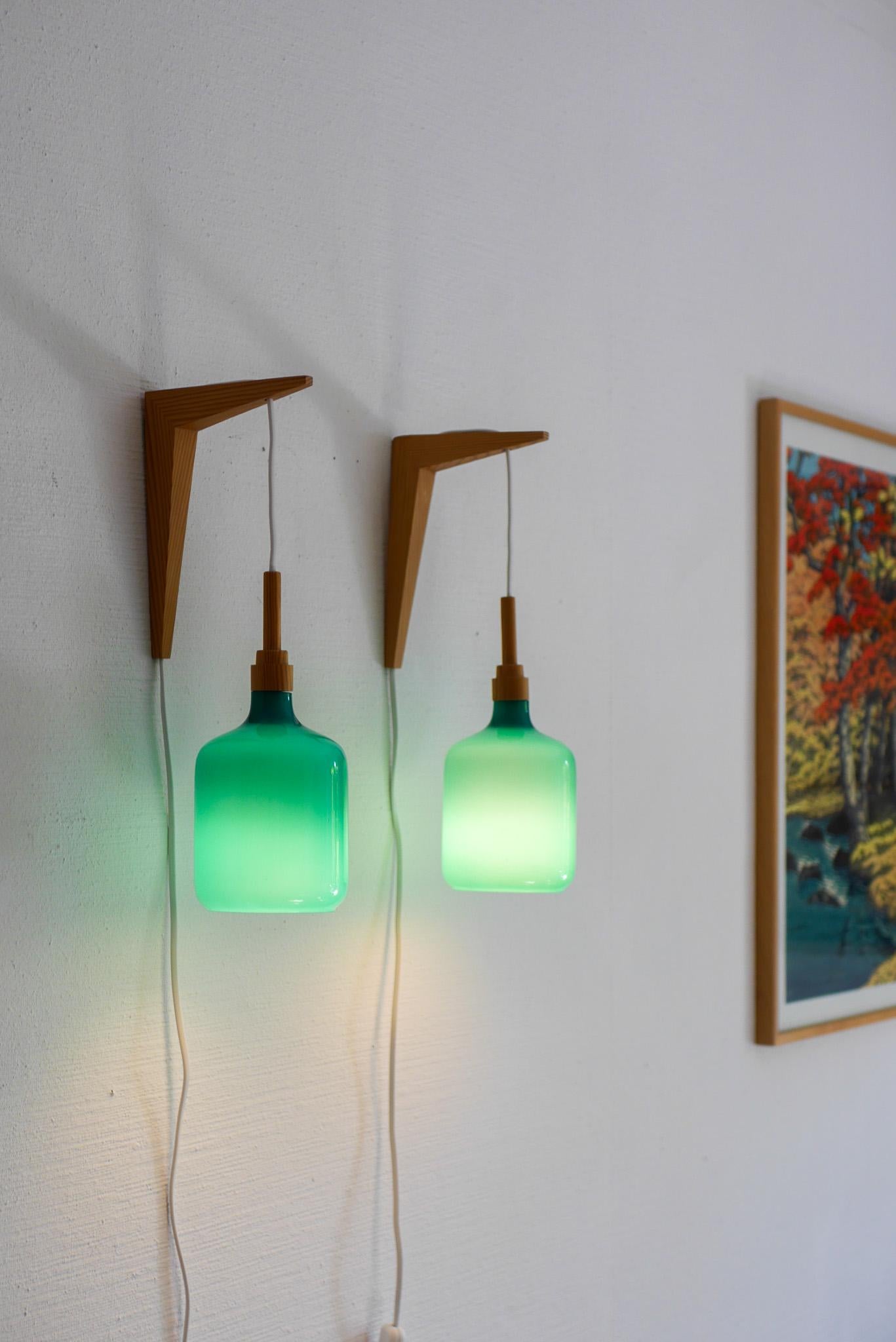 The Scandinavian 70s sconces Mid-century modern opaline glass and pine wall lights en vente 1