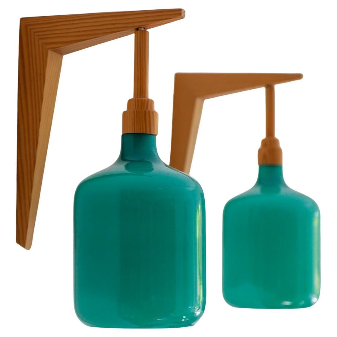 The Scandinavian 70s sconces Mid-century modern opaline glass and pine wall lights en vente
