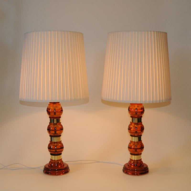 Mid-Century Modern Scandinavian Amber colored glass and brass tablelamp pair from the 1960s