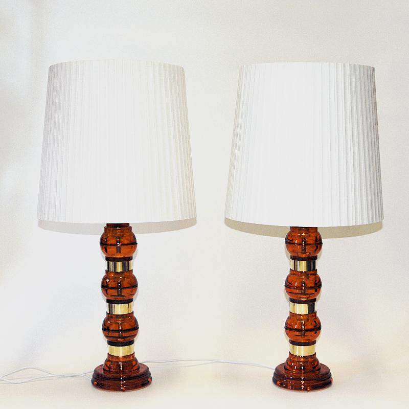 Scandinavian Amber colored glass and brass tablelamp pair from the 1960s 2