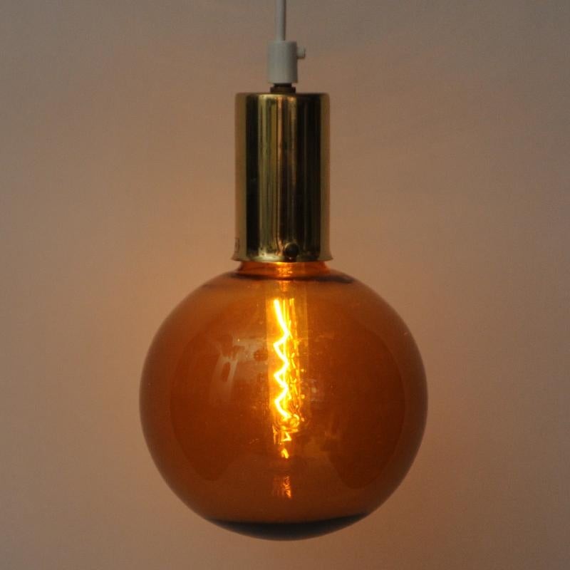 Brass Scandinavian Amber colored glass dome pendant 1970s For Sale