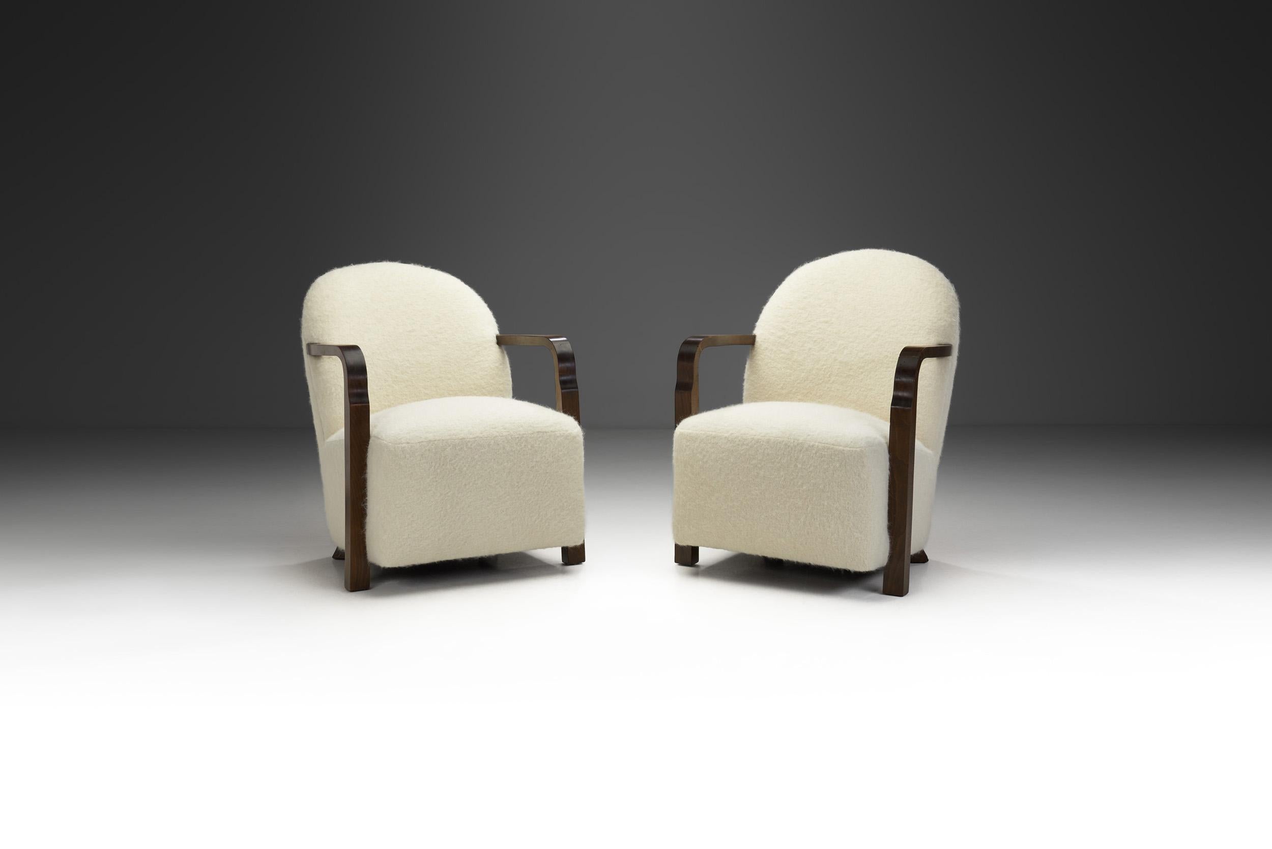 Unsurprisingly, the detailing and glamour of Art Deco married exceptionally well with the simplicity and sleek design of Scandinavia. The result is this pair of chairs: elegance with bold curves with premium materials serving functionality.

As
