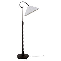 Scandinavian Art Deco Floor Lamp in Brass and Turned Oak, 1920s.