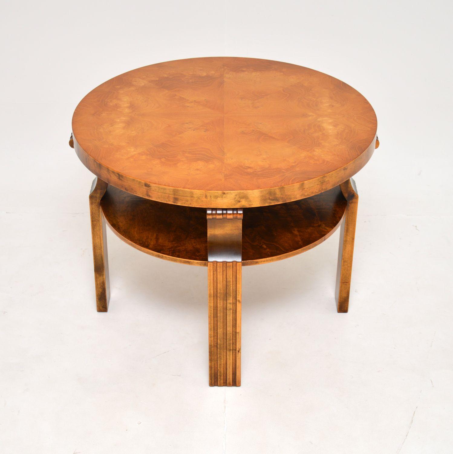 A stunning Scandinavian Art Deco satin birch coffee table, this was made in Norway and dates from the 1920’s.

It is of superb quality and is a great size, with large circular top and useful lower tier. This is mostly constructed from solid satin