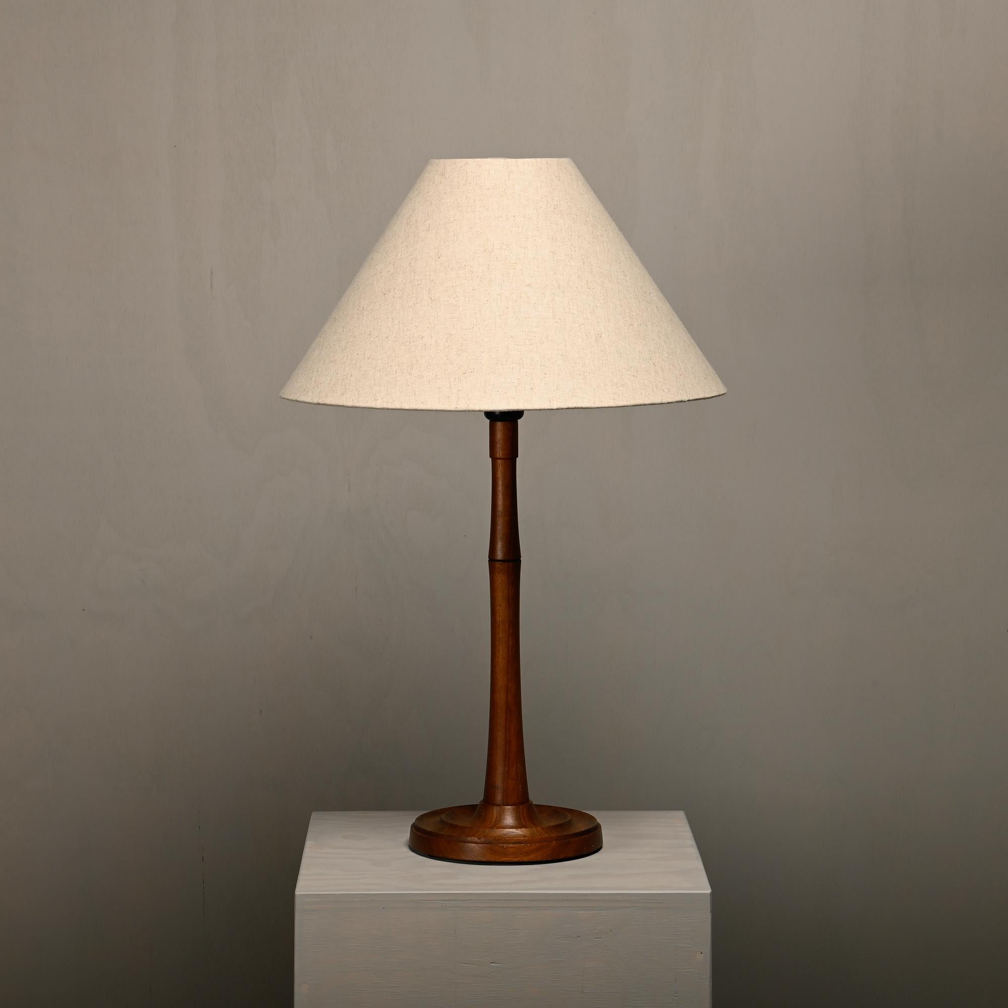 Large Scandinavian Modern Table Lamp Art Deco Style, Denmark 1940s. Solid Teak base. Very good condition and rewired. Including lamp shade.  

Dimensions:  
Base: 47 cm / 18.5