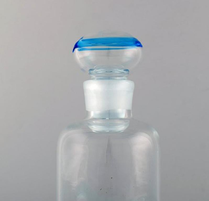 Scandinavian art glass. Carafe in clear and light blue art glass, 1970s.
Measures: 25.5 x 9.5 cm.
In very good condition.