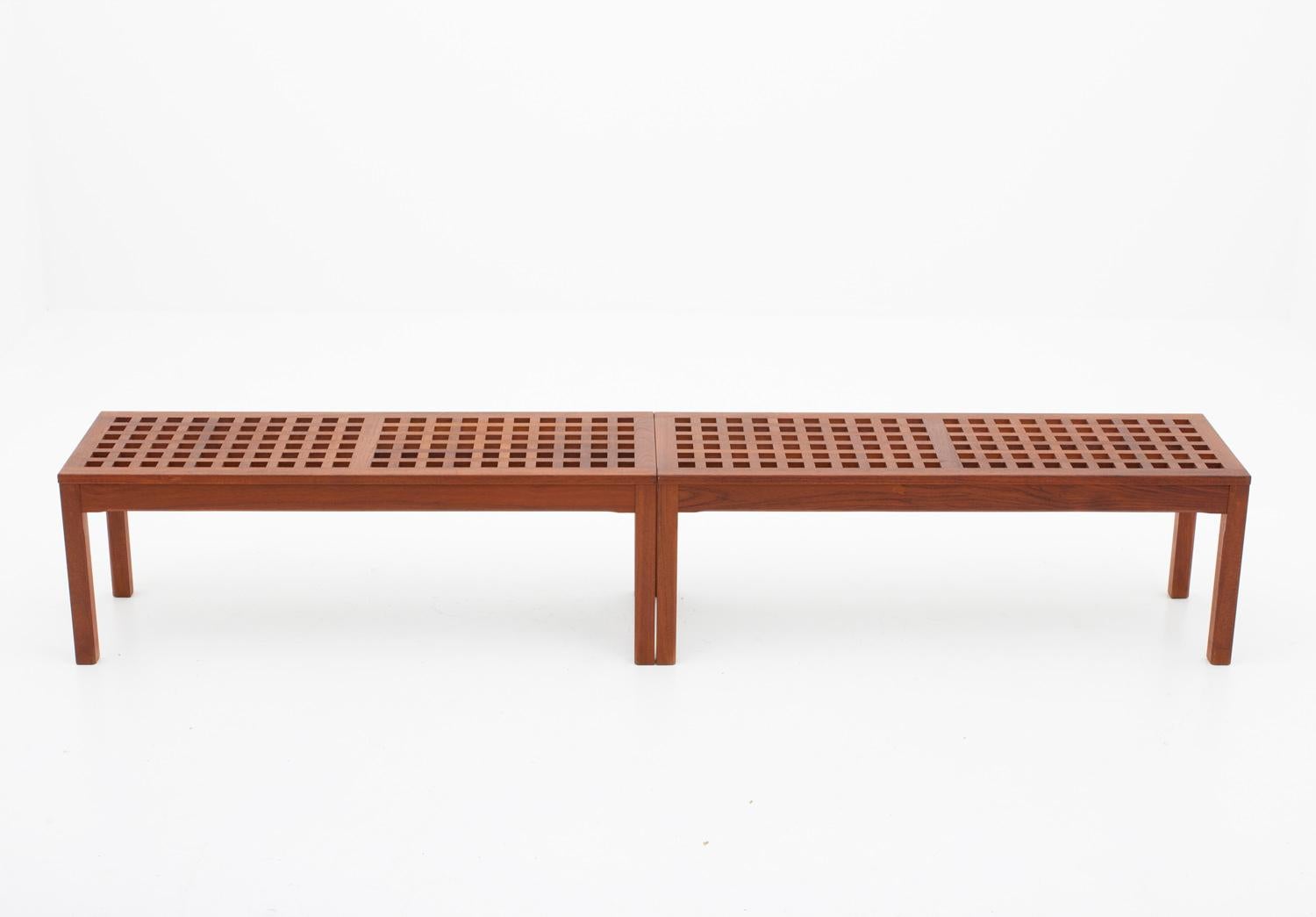 Pair of Scandinavian benches in Teak by John Vedel-Rieper for Källemo (Sweden), 1960s.
Beautiful benches made of solid teak, creating a cross pattern. Very all-round furniture that could be used as, for example, coffee table, plant stand, or media