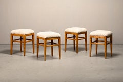 Scandinavian birch stools with light sheepskin seats, 1930s