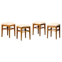 Scandinavian birch stools with light sheepskin seats, 1930s