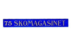 Scandinavian blue glass and gold boutique shoe shop sign